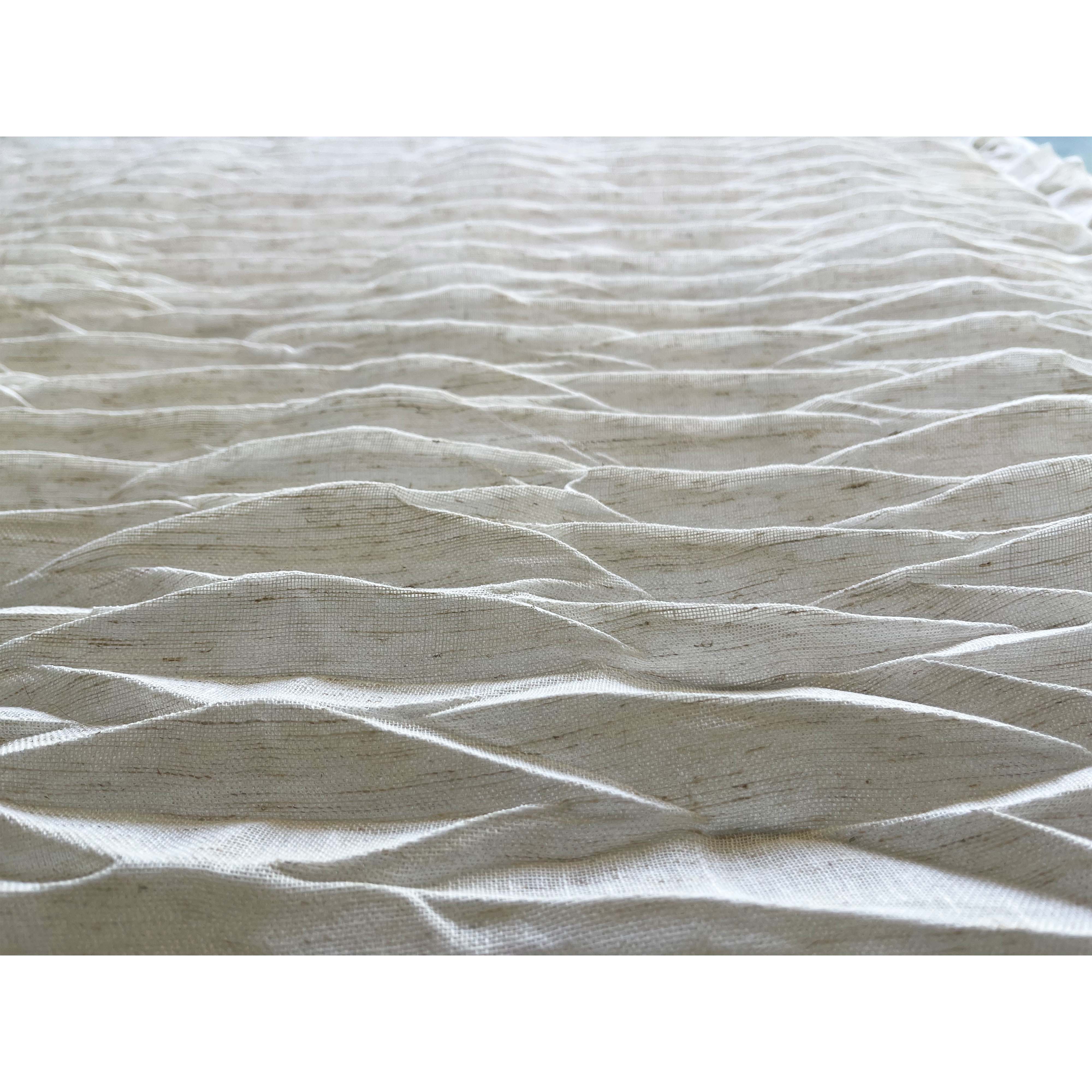 Detalle de plisado en fibra natural